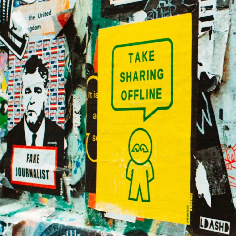 Take sharing offline sticker at a wall