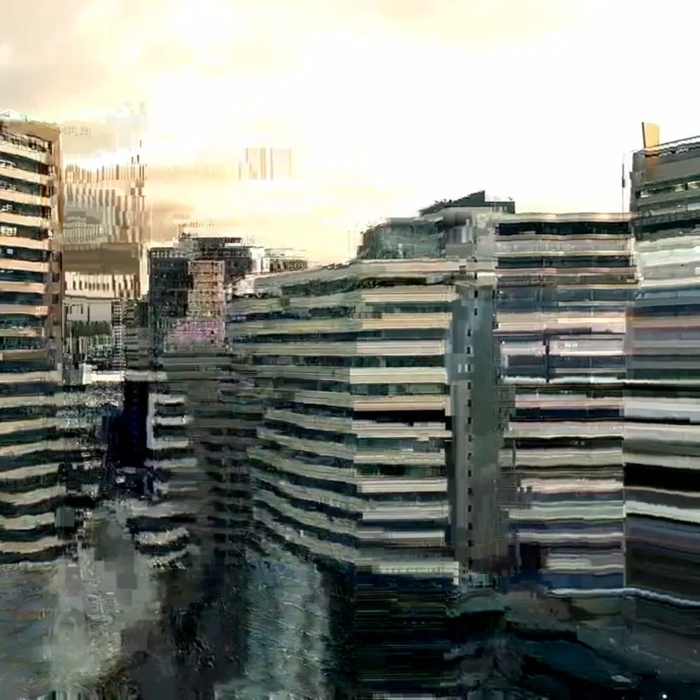 Bild eines Hochhauses, das von digitalen Störungen durchzogen ist.